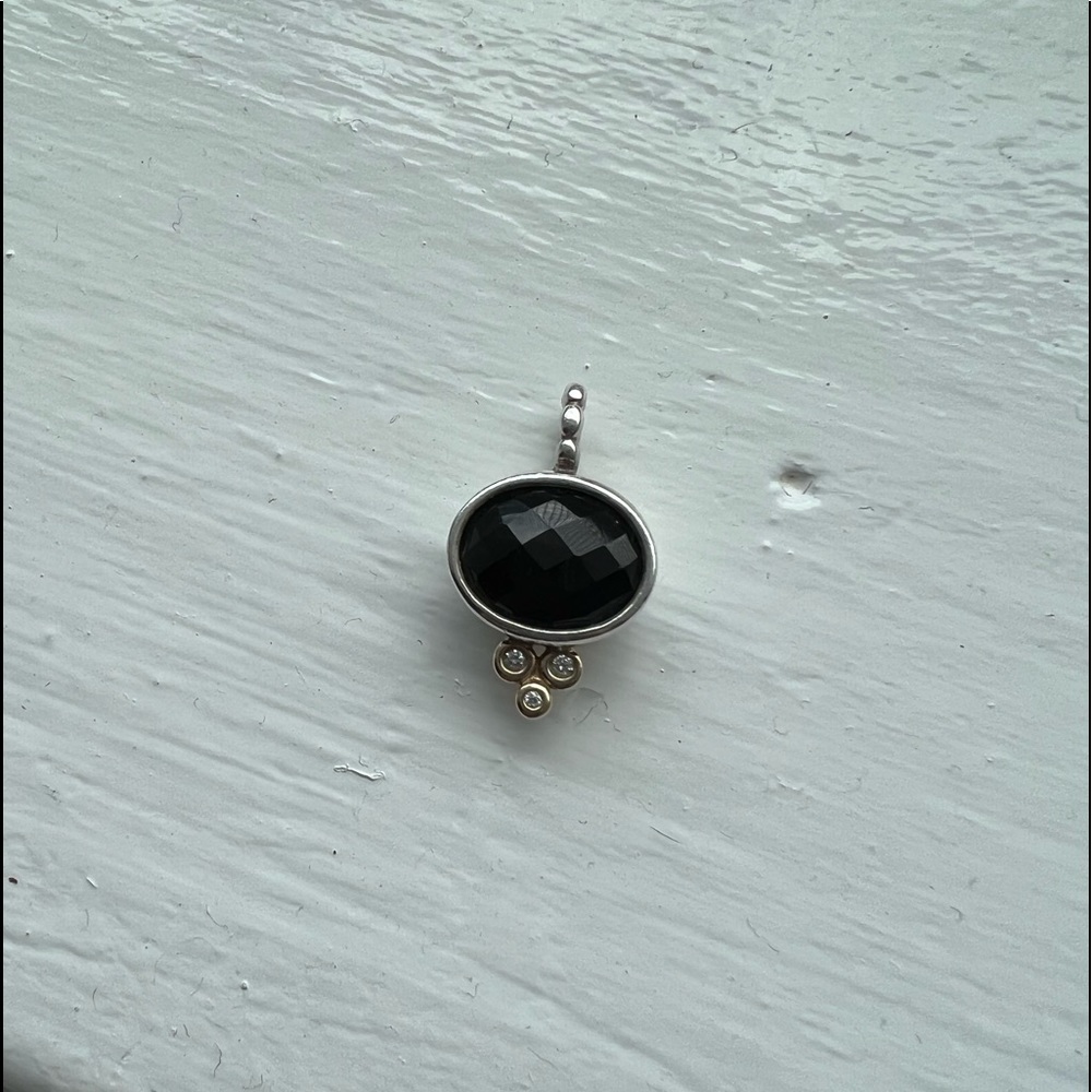 Rare and Retired Pandora Elegant Embrace necklace pendant.